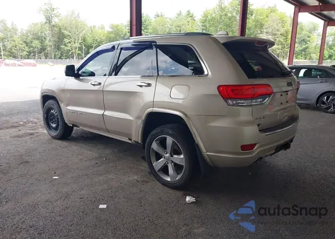 2014 Jeep Grand Cherokee Overland z USA, uszkodzony, nr VIN 1C4RJFCG6EC154797